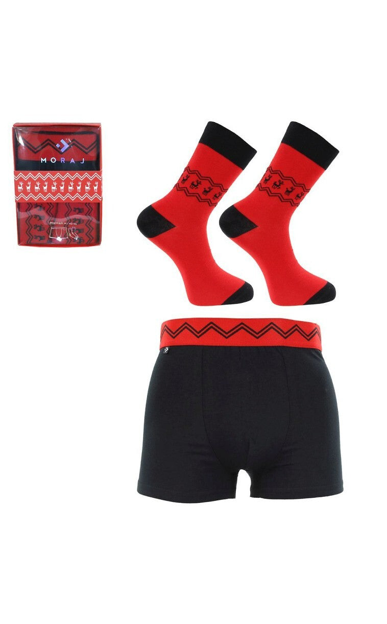 Set natalizio per uomo composto da boxer e calzini decorati con allegri motivi natalizi, perfetti per un tocco di spirito festivo.